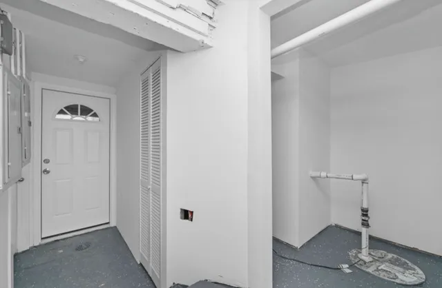 a view of a room with rack on the wall