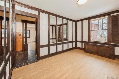 a view of an empty room and window