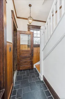 a view of entryway with stairs