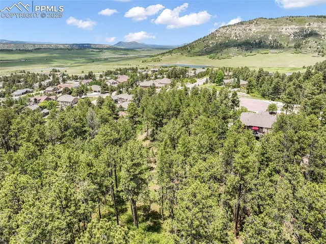 a view of an ocean and a mountain