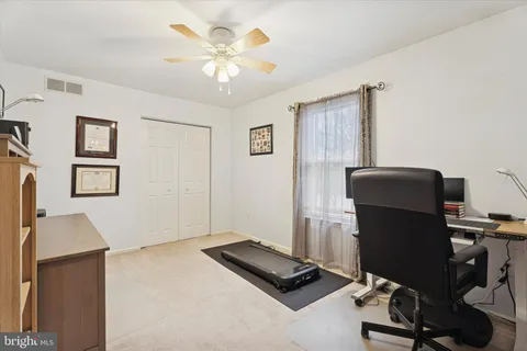 a view of workspace with cabinets