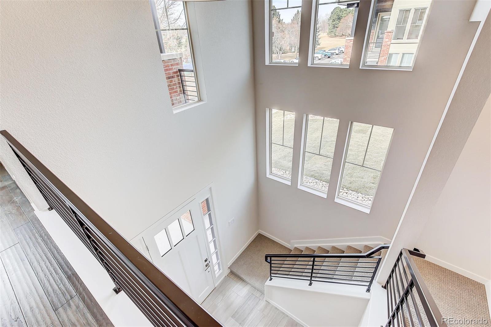192 South Locust Street Denver, CO 80224 - Photo 3 of 18 a view of an entryway with staircase