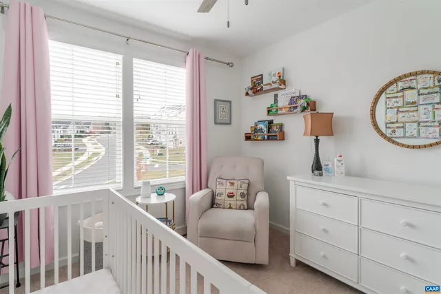 a view of a house with a balcony and wooden floor