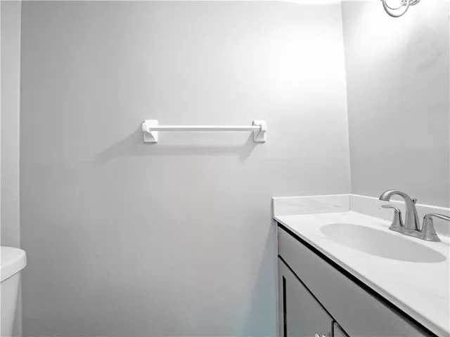 a view of a balcony with wooden floor