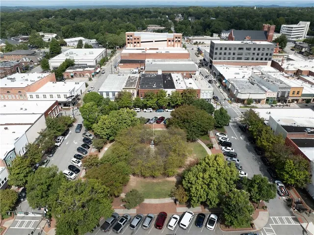a view of a cafe with table and chairs