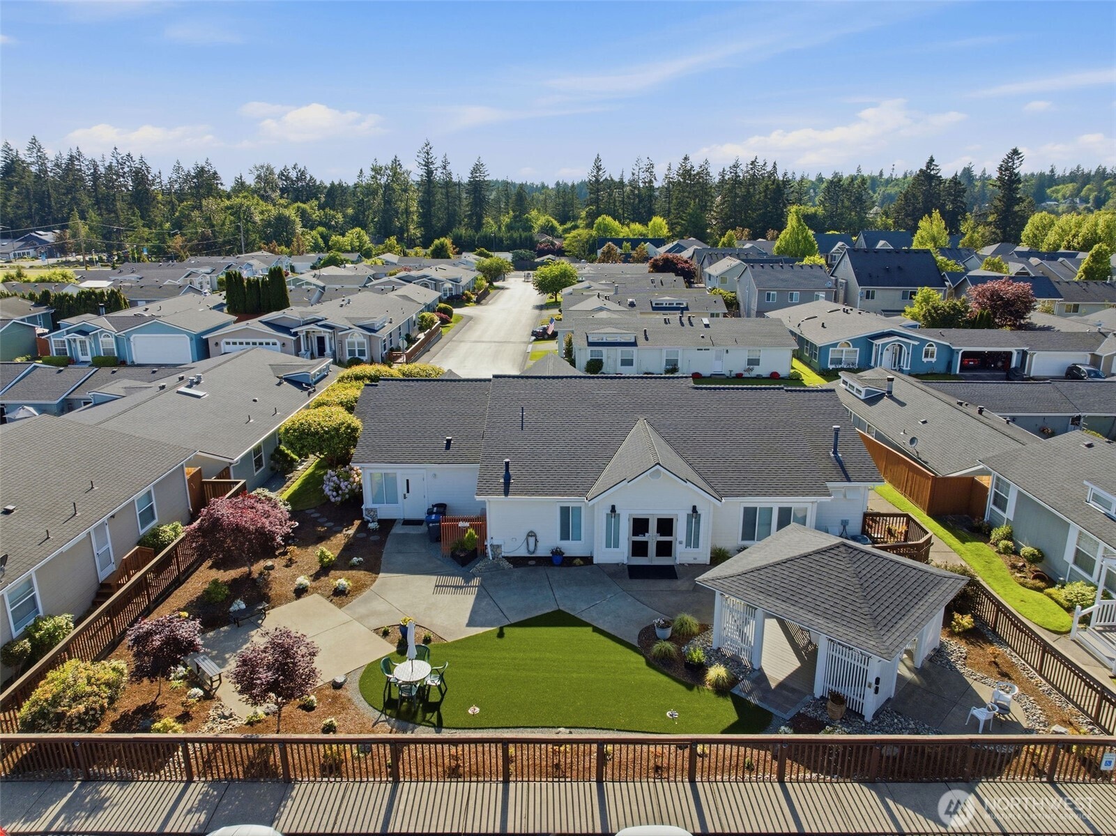 24036 222nd Avenue Southeast Maple Valley, WA 98038 - Photo 33 of 37 a view of multiple houses with yard