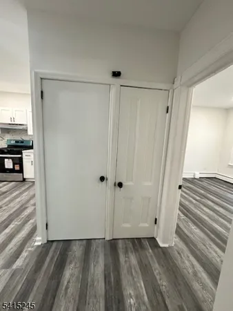 a bathroom with a shower and toilet