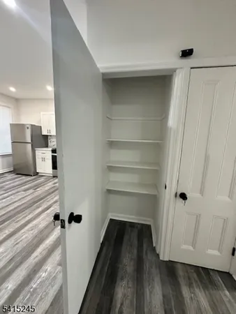 a bathroom with a shower and a sink