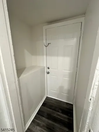 a large kitchen with kitchen island a sink stainless steel appliances and cabinets