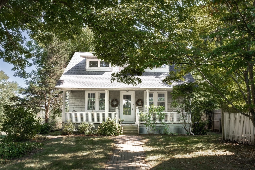 51 Turkey Shore Road Ipswich, MA 01938 - Photo 1 of 23 a front view of a house with a garden