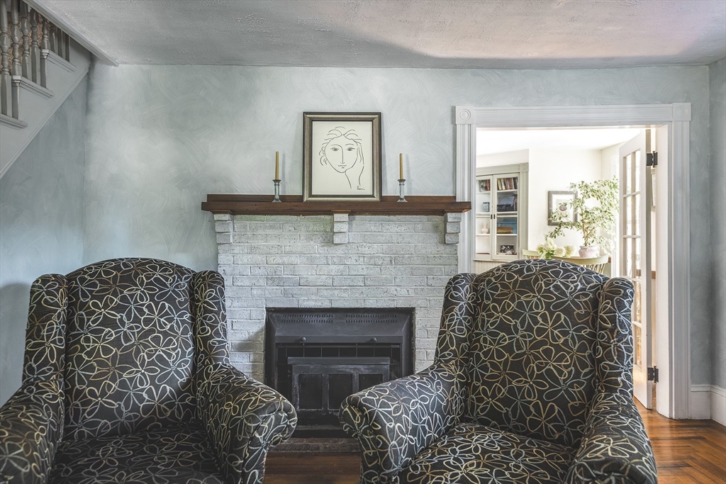 51 Turkey Shore Road Ipswich, MA 01938 - Photo 13 of 23 a living room with furniture and a fireplace