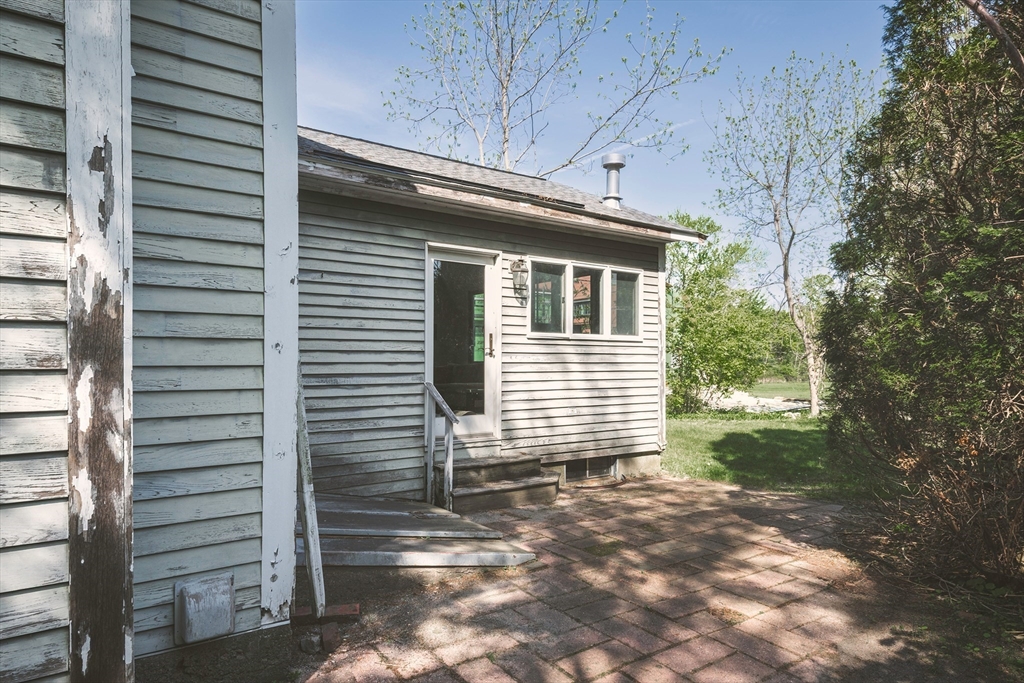 51 Turkey Shore Road Ipswich, MA 01938 - Photo 20 of 23 a view of a house with a yard