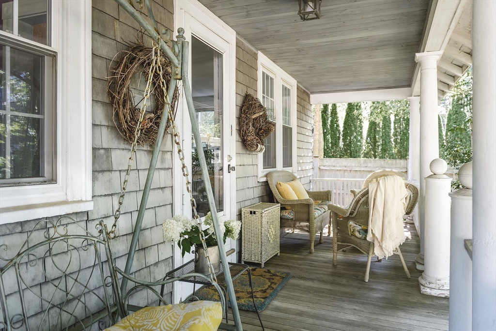 51 Turkey Shore Road Ipswich, MA 01938 - Photo 5 of 23 a view of a patio with table and chairs and potted plants
