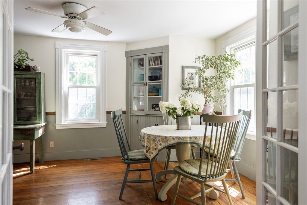 51 Turkey Shore Road Ipswich, MA 01938 - Photo 6 of 23 a view of a dining room with furniture window and outside view