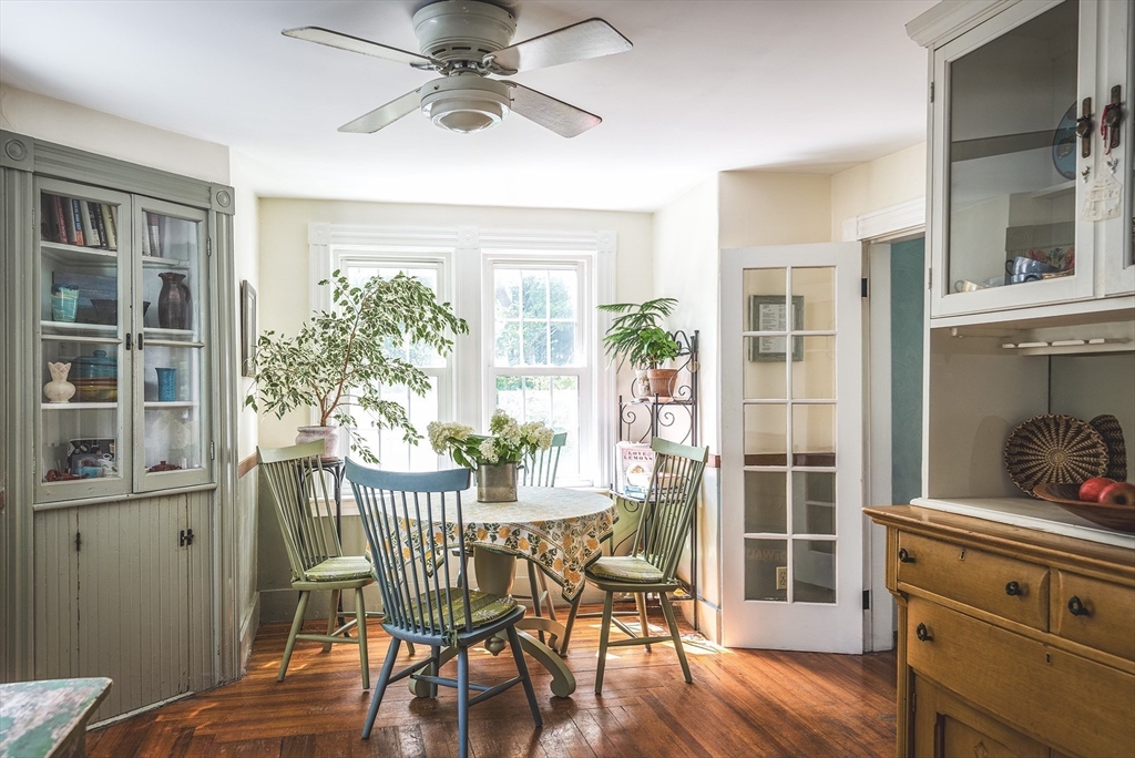 51 Turkey Shore Road Ipswich, MA 01938 - Photo 7 of 23 a view of a dining room with furniture window and wooden floor