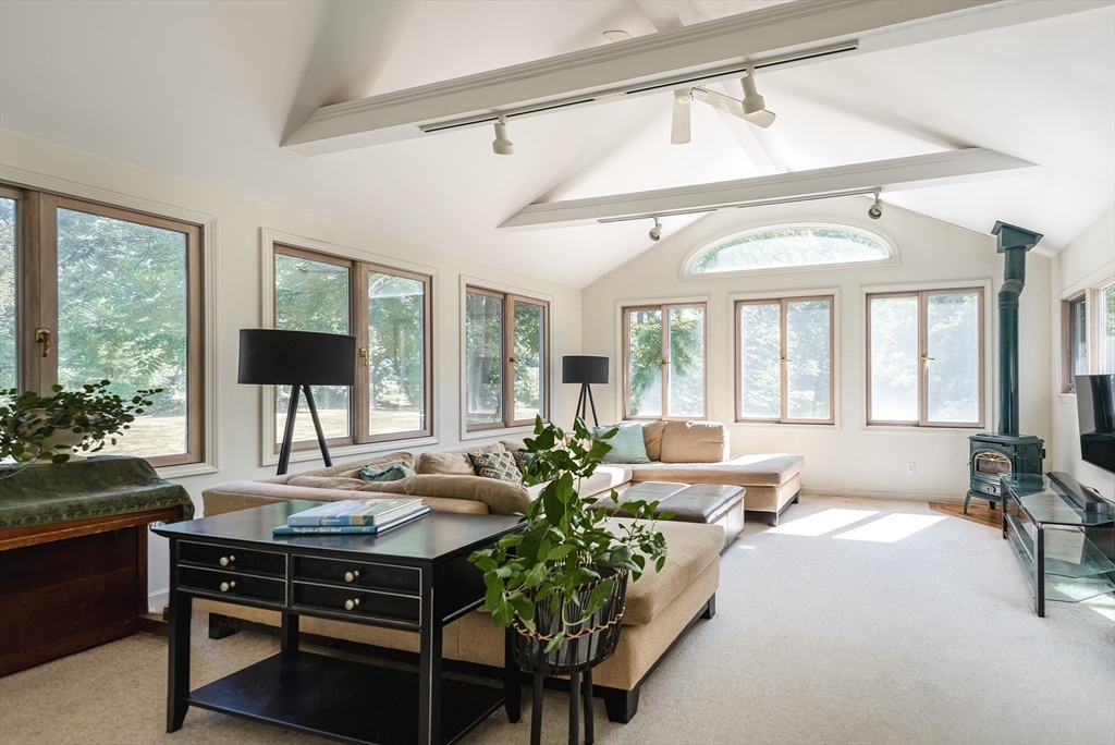 51 Turkey Shore Road Ipswich, MA 01938 - Photo 9 of 23 a living room with furniture and a large window