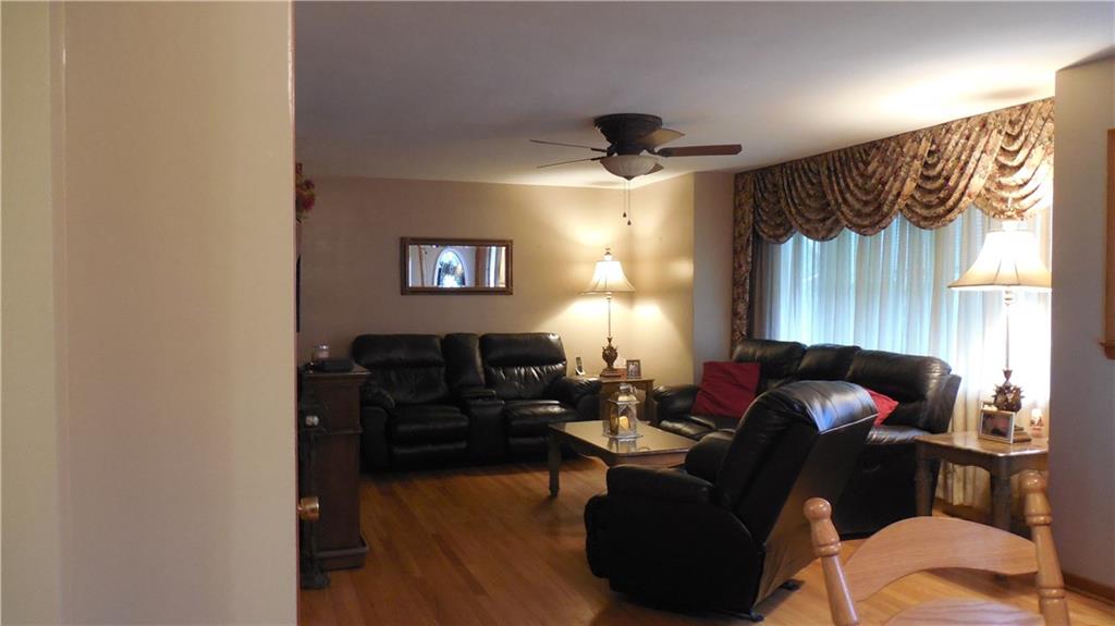 2110 Pulaski Road New Castle, PA 16105 - Photo 3 of 25 Open living room with custom made drapes (included)