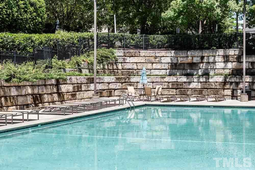 8308 Chimneycap Drive Raleigh, NC 27613 - Photo 22 of 23 Stroll across the street for a dip in the community pool!