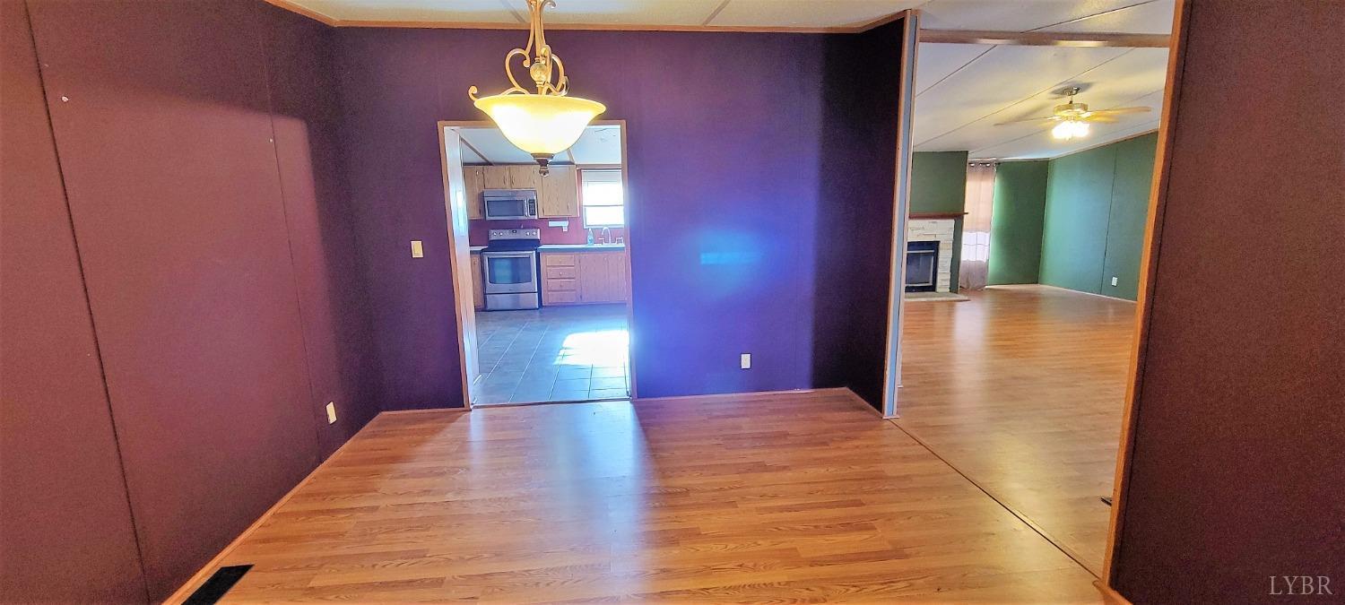 1015 Spring Mill Road Concord, VA 24538 - Photo 20 of 54 a view of a livingroom with a chandelier