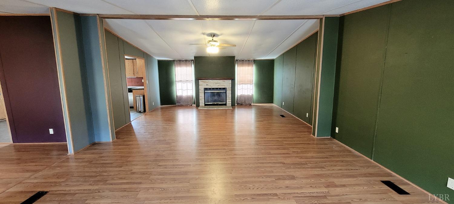 1015 Spring Mill Road Concord, VA 24538 - Photo 2 of 54 a view of a hallway view with wooden floor and staircase