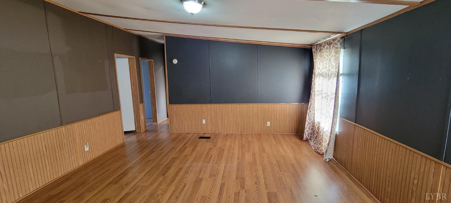 1015 Spring Mill Road Concord, VA 24538 - Photo 29 of 54 a view of a room with wooden floor and stairs