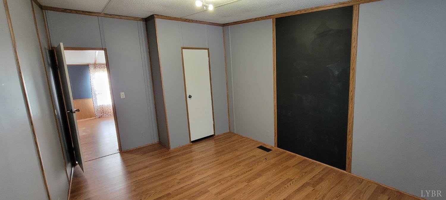 1015 Spring Mill Road Concord, VA 24538 - Photo 33 of 54 a view of hallway with wooden floor