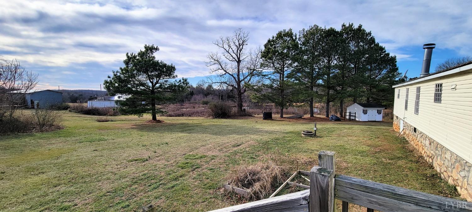 1015 Spring Mill Road Concord, VA 24538 - Photo 44 of 54 a view of a yard with large trees