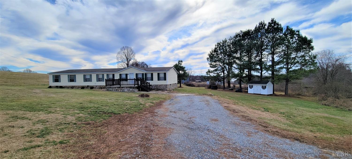 1015 Spring Mill Road Concord, VA 24538 - Photo 50 of 54 a front view of a house with garden