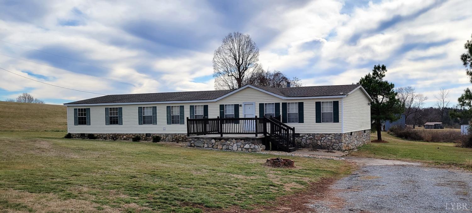 1015 Spring Mill Road Concord, VA 24538 - Photo 51 of 54 a front view of a house with a yard