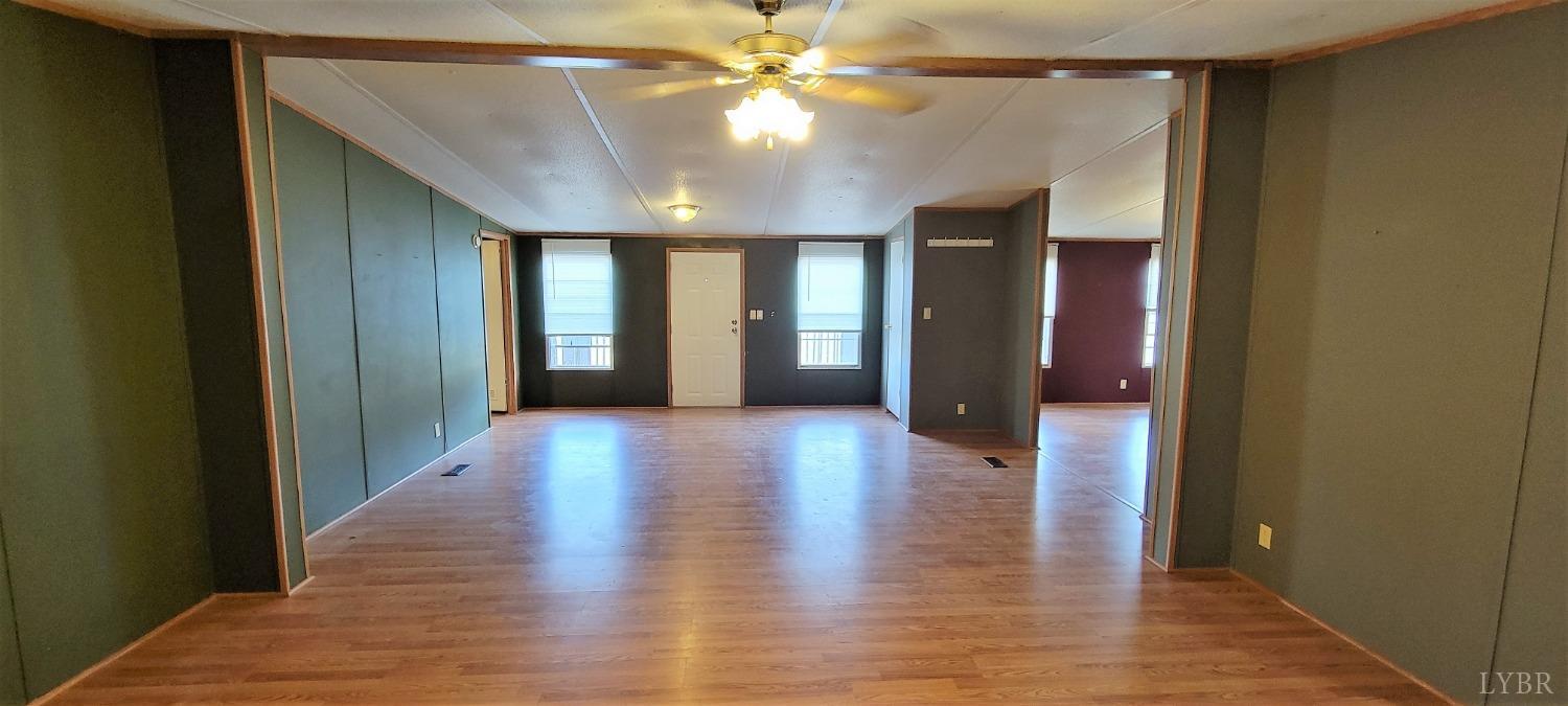 1015 Spring Mill Road Concord, VA 24538 - Photo 6 of 54 a view of a hallway with wooden floor
