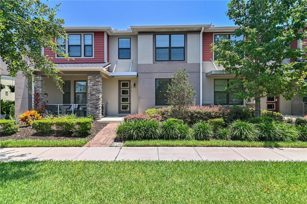front view of a house with a yard