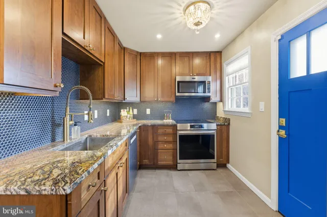 a bed room with a bed and a window