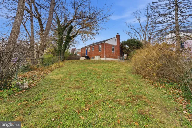 an aerial view of a house with swimming pool