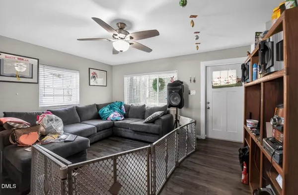 a living room with furniture and a window
