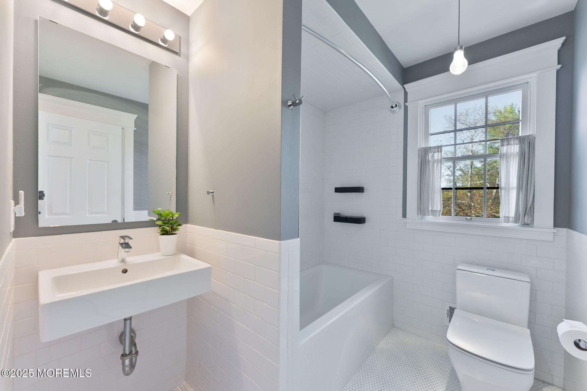 4 Cherry Hill Road Holmdel, NJ 07733 - Photo 18 of 34 a bathroom with a sink a toilet and shower