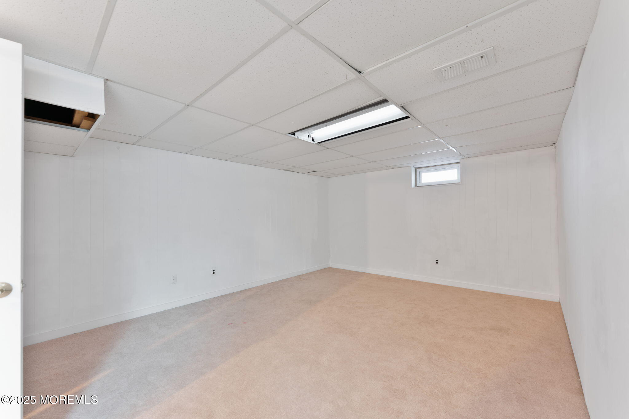 4 Cherry Hill Road Holmdel, NJ 07733 - Photo 23 of 34 an empty room with an entryway and fan