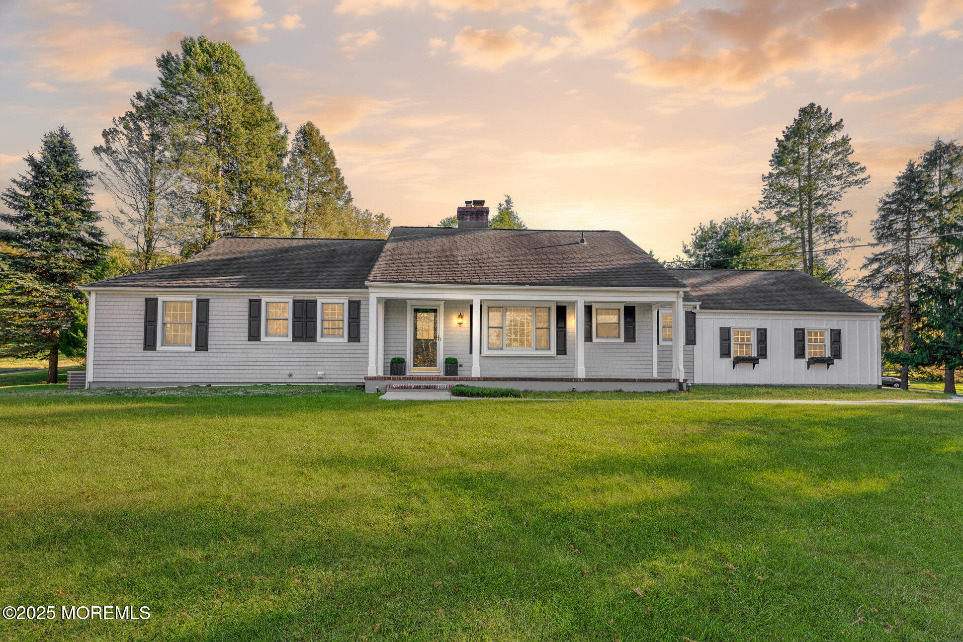 4 Cherry Hill Road Holmdel, NJ 07733 - Photo 34 of 34 a front view of a house with a garden