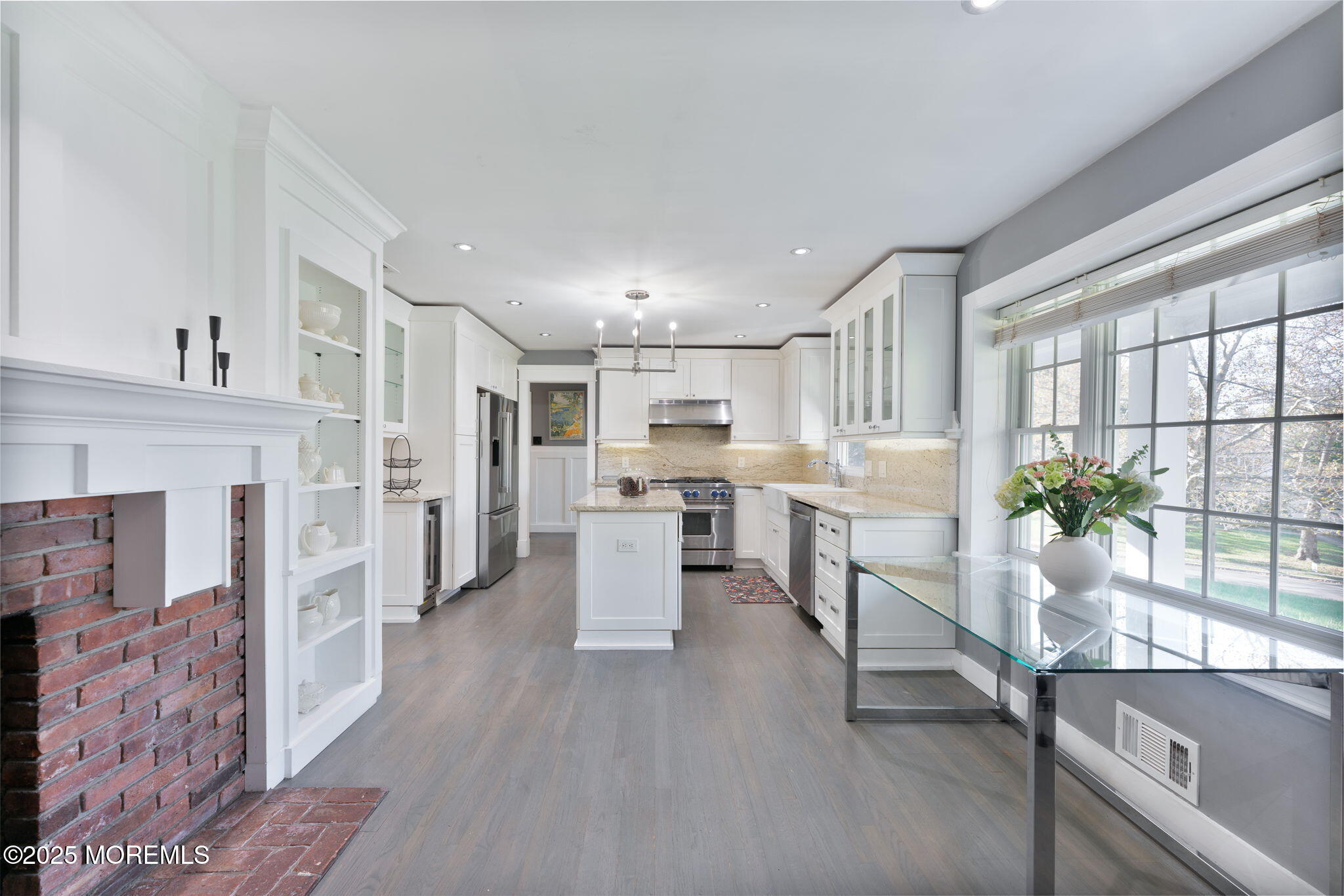 4 Cherry Hill Road Holmdel, NJ 07733 - Photo 7 of 34 a living room with furniture and a fireplace
