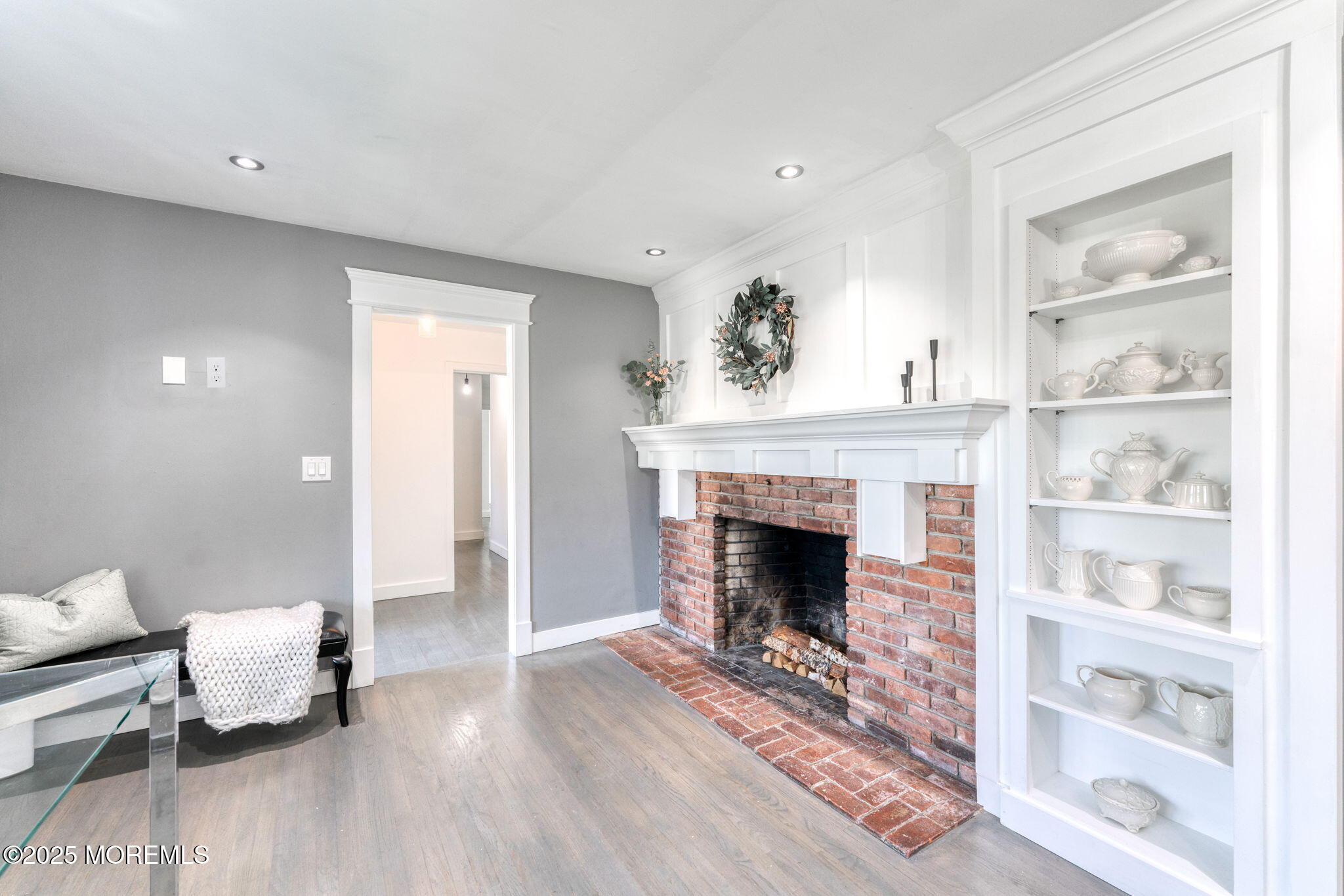 4 Cherry Hill Road Holmdel, NJ 07733 - Photo 8 of 34 a living room with furniture and a fireplace
