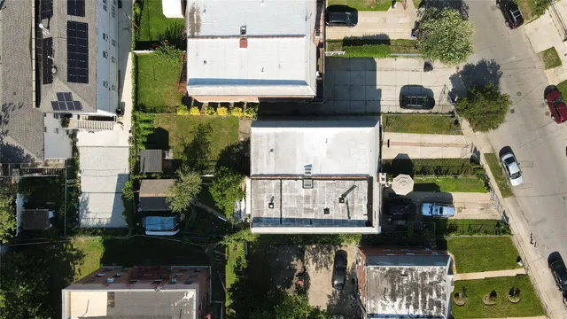 an aerial view of houses and roads