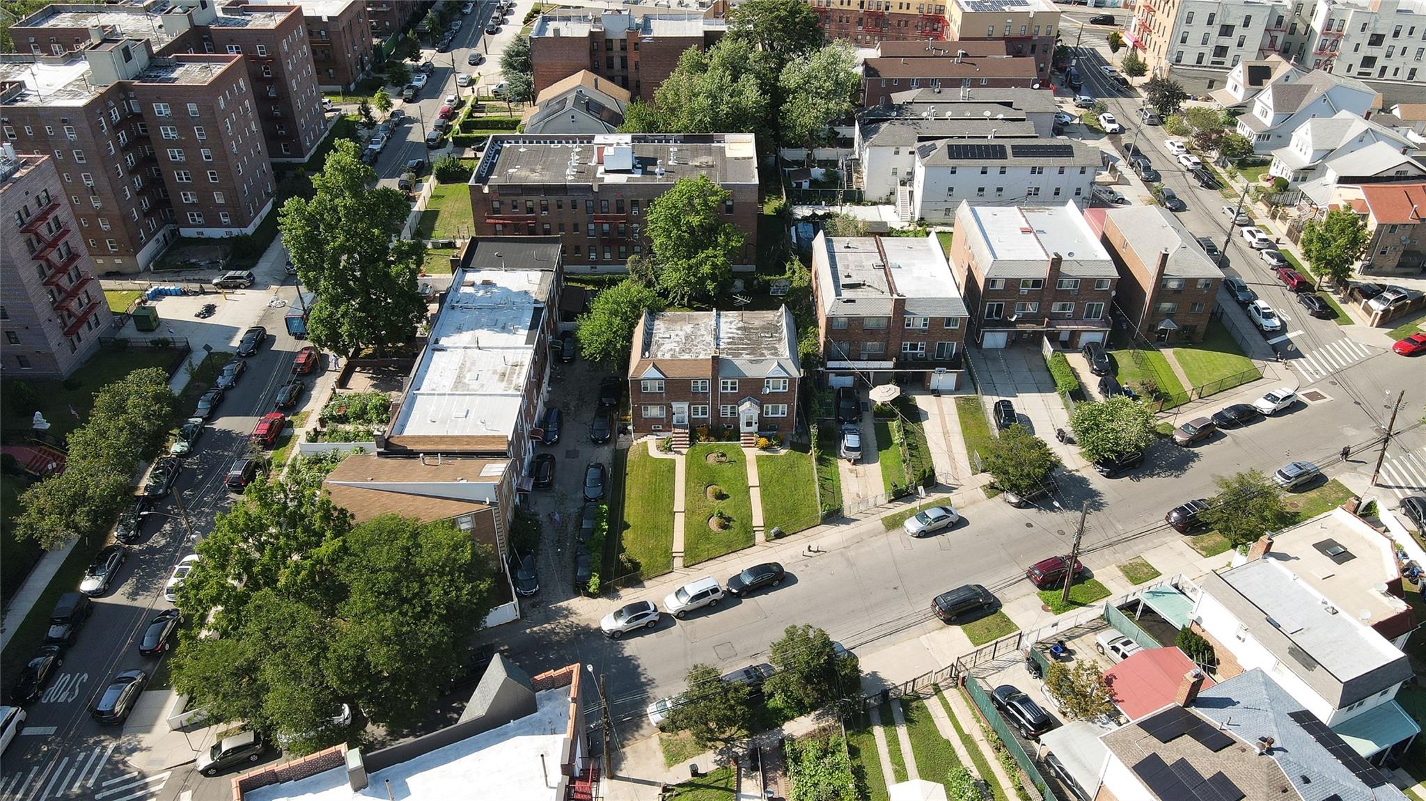 195-11 Woodhull Avenue Queens, NY 11423 - Photo 10 of 13 an aerial view of residential houses with outdoor space
