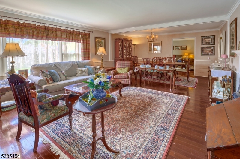 245 Old Turnpike Road Califon, NJ 07830 - Photo 17 of 31 a living room with furniture a wooden floor and a table