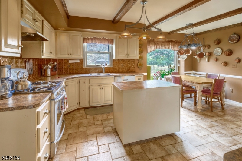 245 Old Turnpike Road Califon, NJ 07830 - Photo 20 of 31 a kitchen with a sink a counter top space and appliances