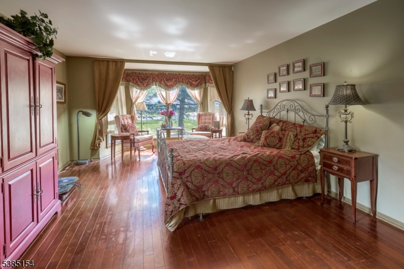 245 Old Turnpike Road Califon, NJ 07830 - Photo 23 of 31 a bed room with a bed and a large window