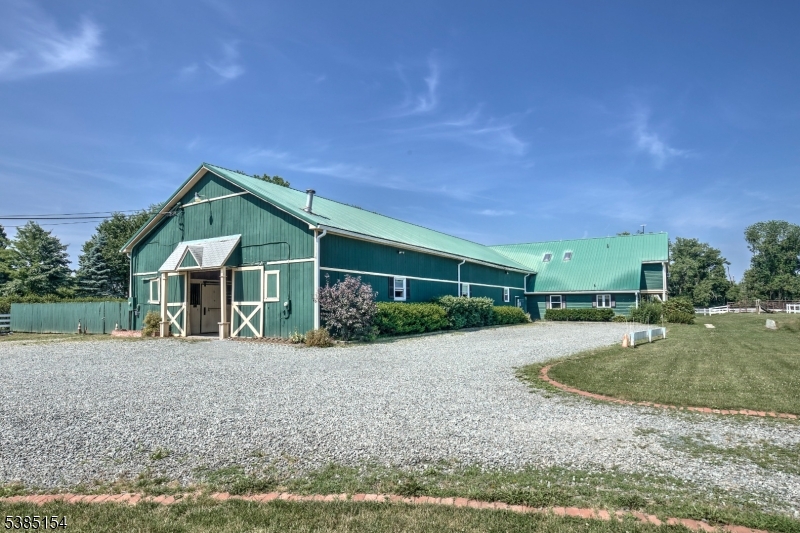 245 Old Turnpike Road Califon, NJ 07830 - Photo 4 of 31 a front view of house with yard and trees around