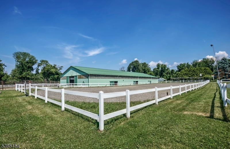 245 Old Turnpike Road Califon, NJ 07830 - Photo 5 of 31 a view of a yard with wooden fence