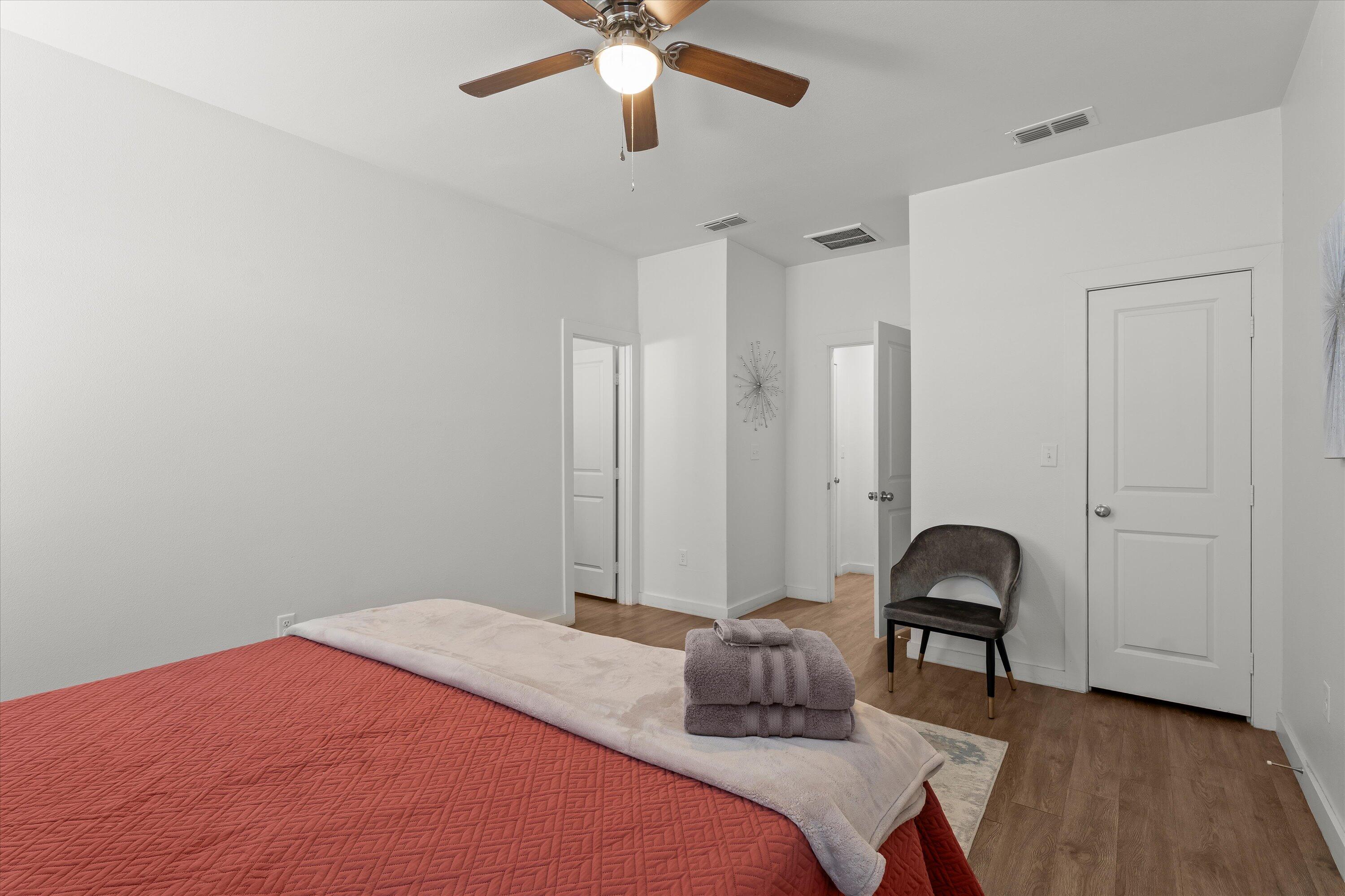 5736 Lehigh Street Lubbock, TX 79416 - Photo 11 of 23 a bedroom with a bed and a dresser
