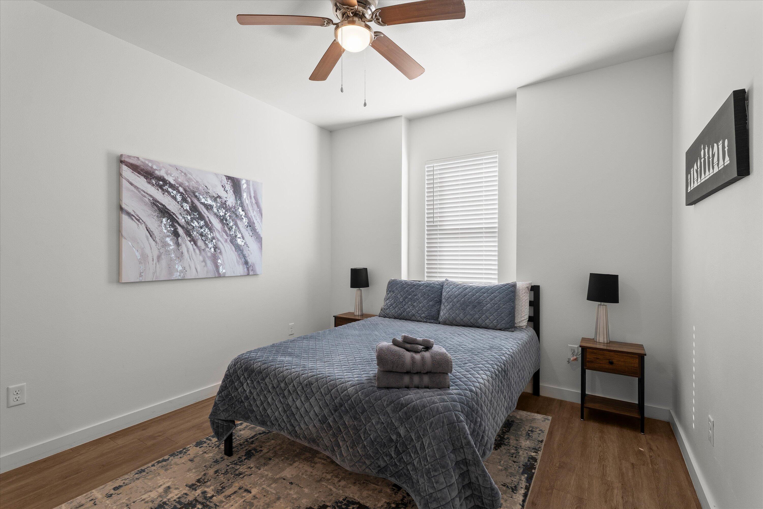 5736 Lehigh Street Lubbock, TX 79416 - Photo 18 of 23 a bedroom with a bed and a window