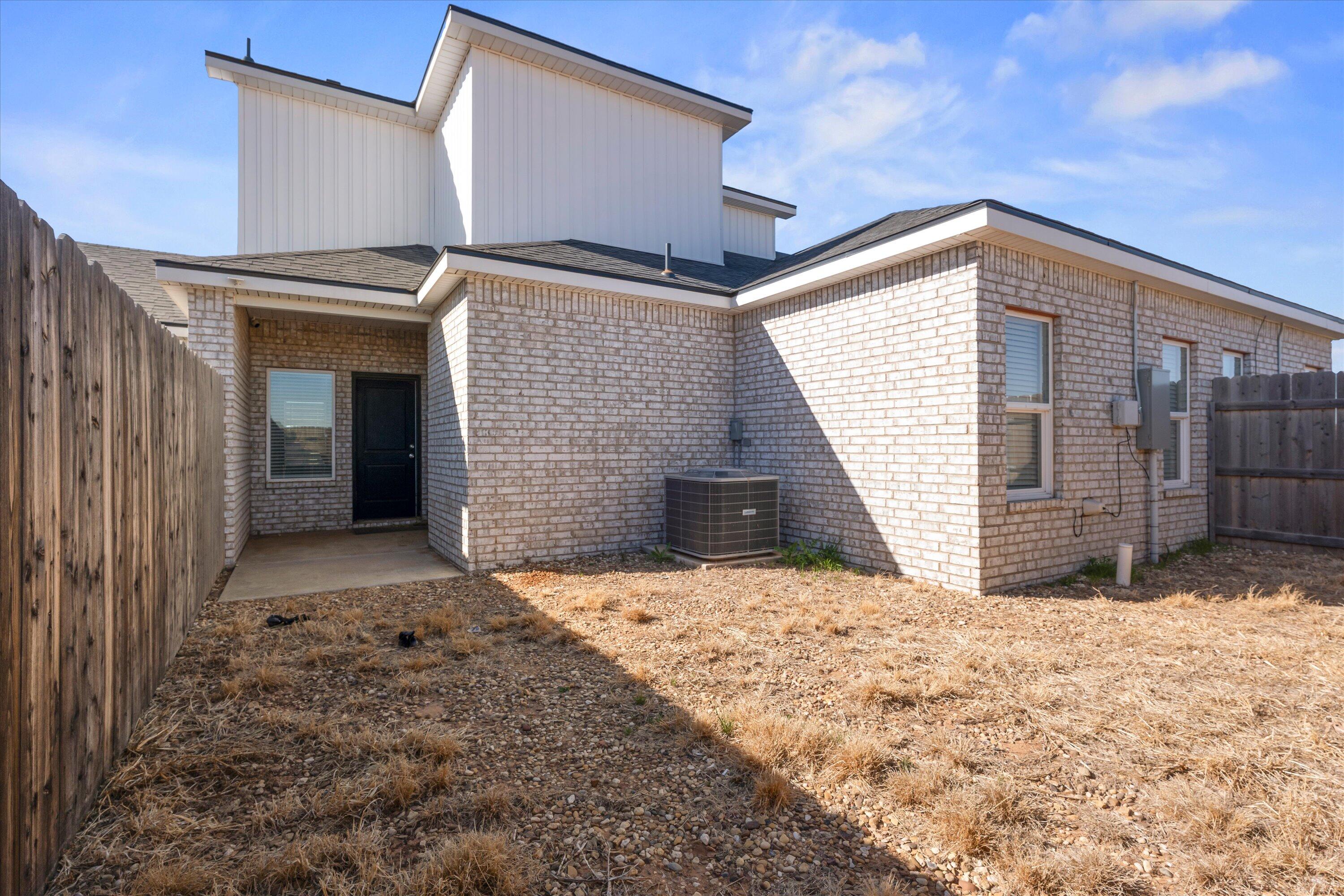 5736 Lehigh Street Lubbock, TX 79416 - Photo 23 of 23 a view of a house with a yard