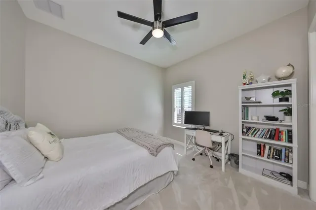 a large kitchen with stainless steel appliances granite countertop a lot of counter space and wooden floors